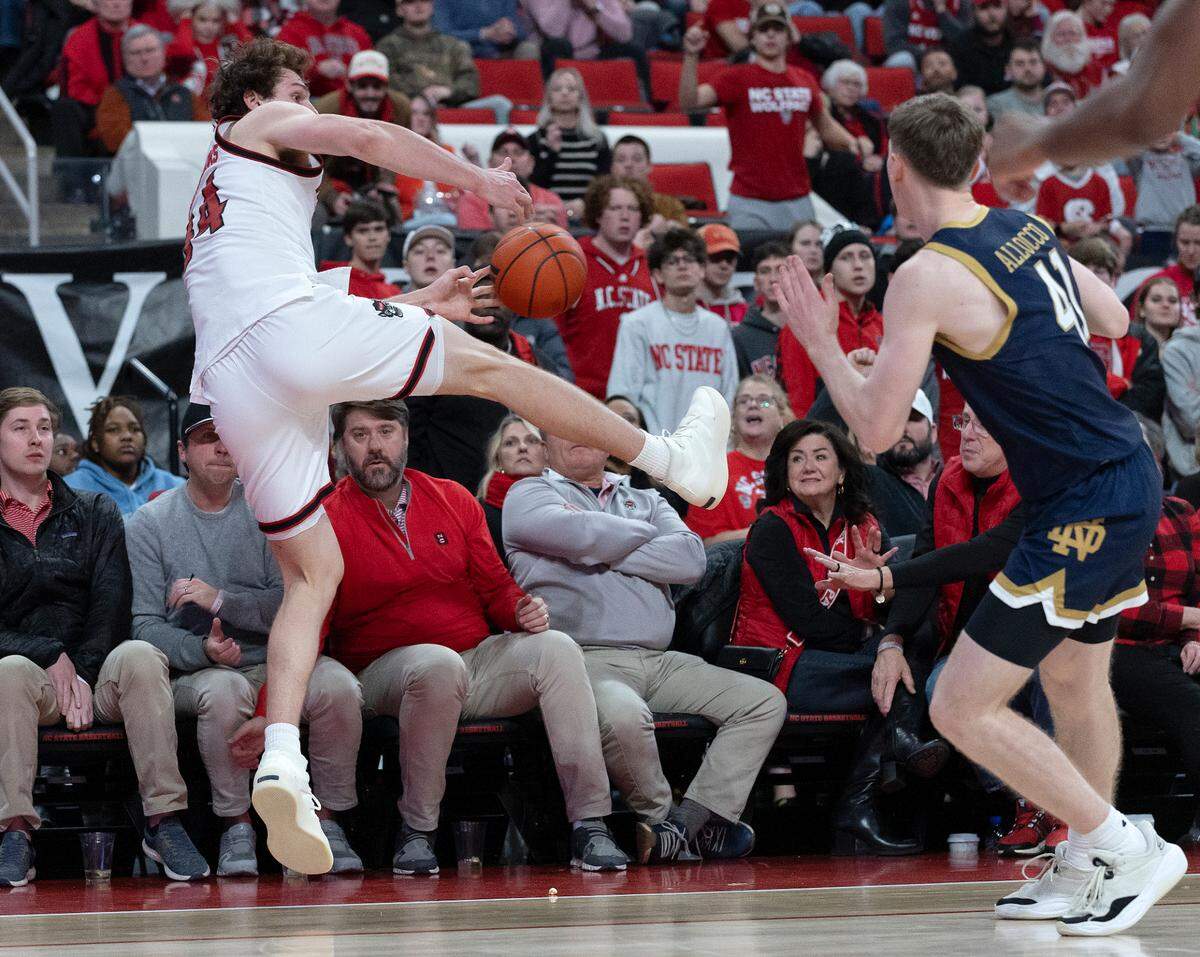 N.C. State’s Ben Middlebrooks saves the ball from going out of bounds during the second half of the Wolfpack’s 66-65 win over Notre Dame on Wednesday, Jan. 8, 2025, at Lenovo Center in Raleigh, N.C.