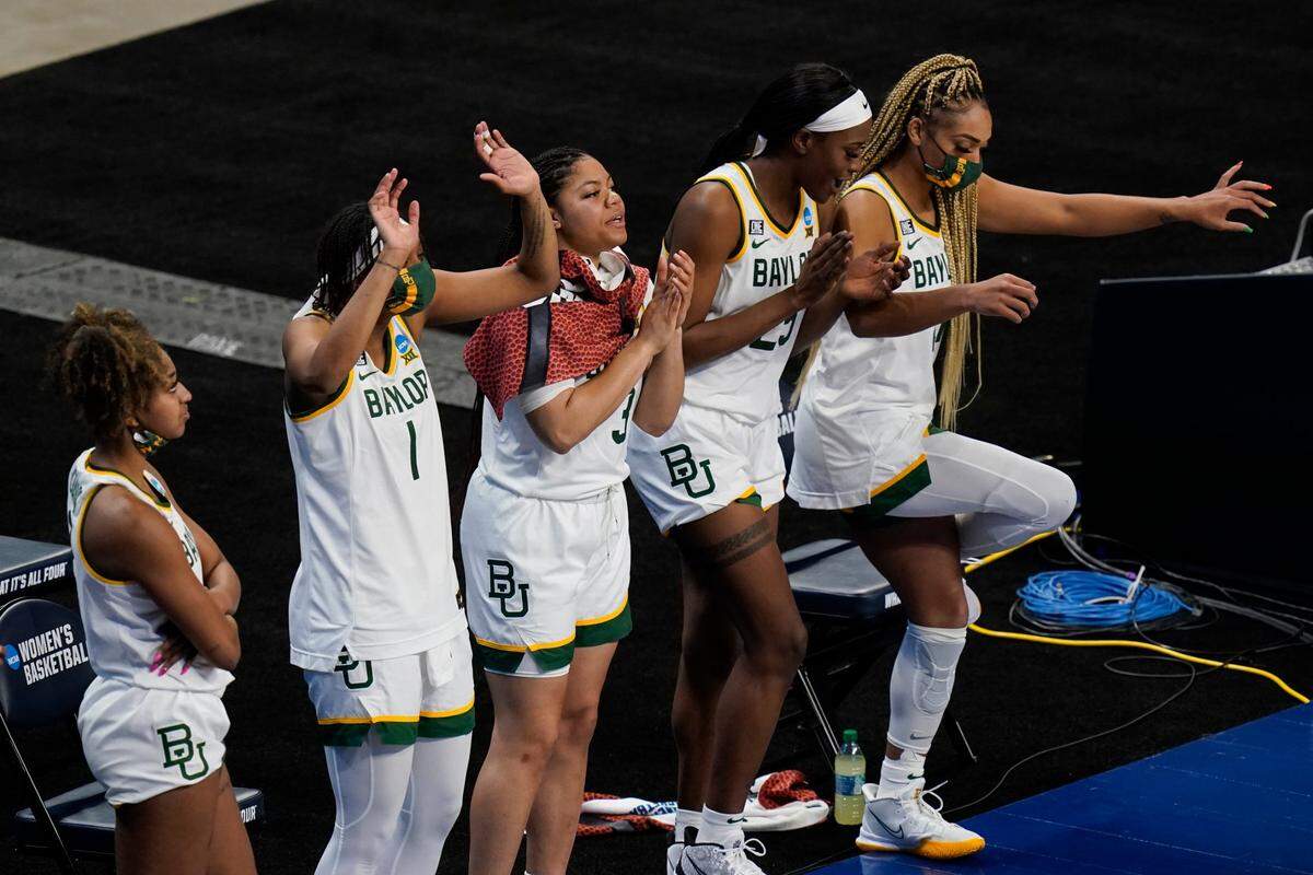 Baylor players celebrate on the bench during the second half of a college basketball game against Jackson State in the first round of the women’s NCAA tournament at the Alamodome, Sunday, March 21, 2021, in San Antonio. Baylor won 101-52. 