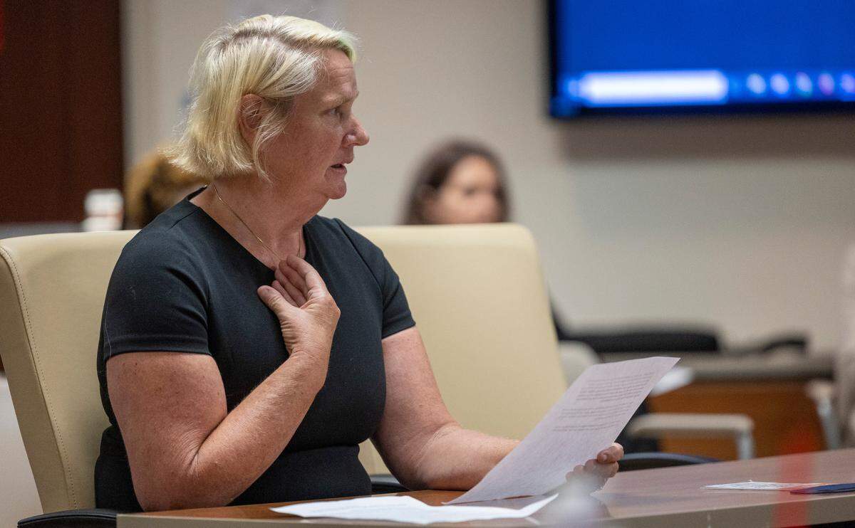 Pam Van Emden, an N.C. State employee, urges the NC State Health Plan board to maintain coverage of the medication weight loss medications called GLP-1s during a board meeting in Raleigh Thursday, Oct. 26, 2023. The NC State Health Plan voted to remove coverage of GLP-1s, which have generated publicity for their remarkable efficacy and have become widely popular among the plan’s members.
