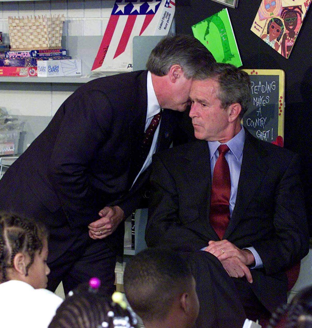In this Sept. 11, 2001 file photo, President Bush’s Chief of Staff Andy Card whispers into the ear of the President to give him word of the plane crashes into the World Trade Center, during a visit to the Emma E. Booker Elementary School in Sarasota, Fla.