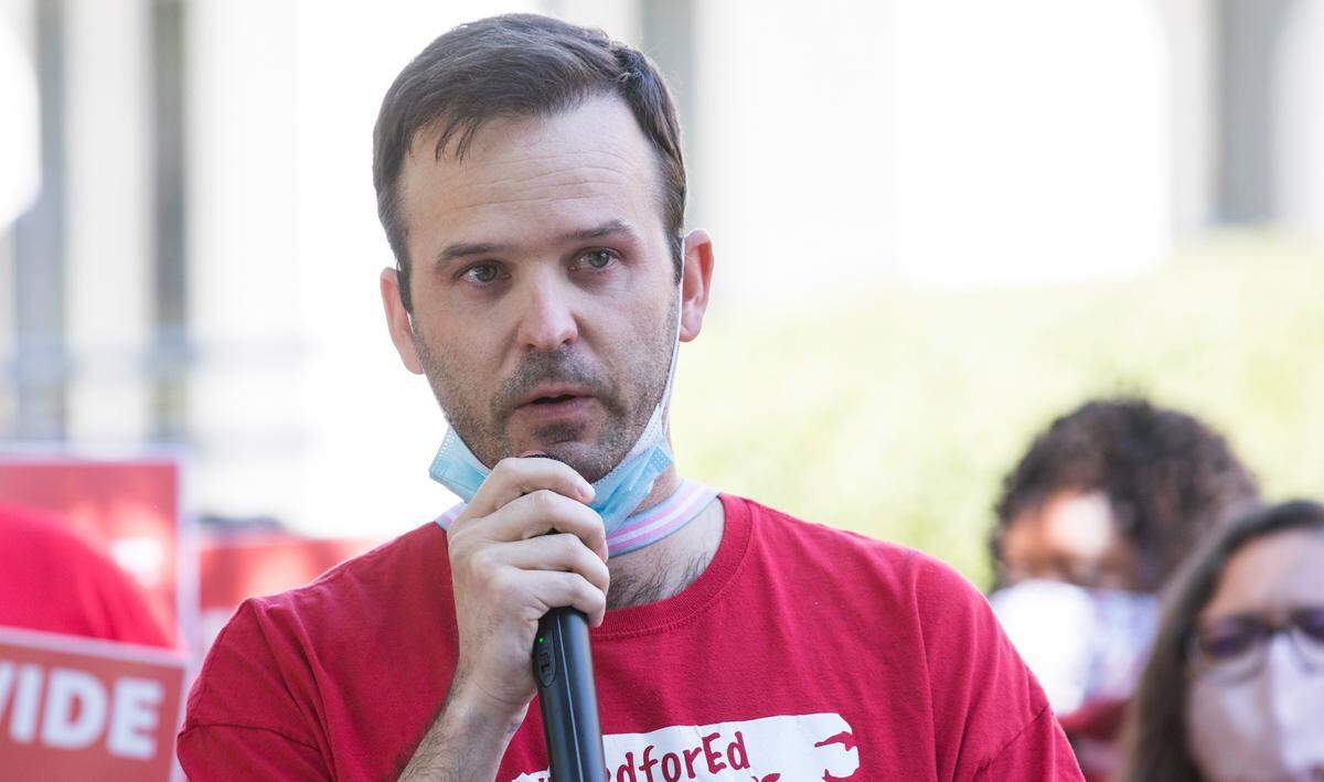 Wake County bus driver Zac Campbell makes an emotional plea for a statewide solution to a shortage of bus drivers during a press conference at the General Assembly in Raleigh, N.C. on Friday, Sept. 10, 2021.