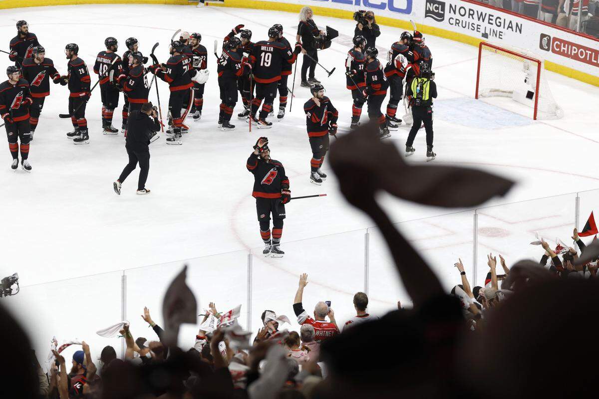Canes players acknowledge the fans after the Hurricanes’ 6-1 victory over the Canadiens in game five of the Eastern Conference Finals at the Lenovo Center Friday, May 29, 2026.