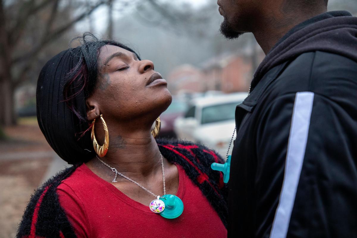 Brittany Brown, 28, left, and Damaris Burnette, 27, stand for a portrait on Friday, Jan. 3, 2020, outside their apartment at McDougald Terrace, the largest public housing community in Durham, N.C., where they believe their one-month-old son Britain Brown died of carbon monoxide poisoning on Dec. 8, 2019, soon after another infant in the community also died suddenly on Nov. 20, 2019. After the deaths and several other poisoning reports, housing officials conducted inspections of all units and held a community meeting.