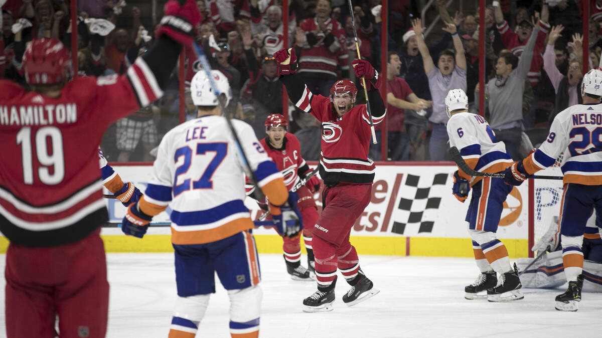 Carolina Hurricanes’ Jordan Staal (11) celebrates his goal at 18:25 in the third period to tie the Islanders 1-1 and force overtime on Thursday, October 4, 2018 at PNC Arena in Raleigh, N.C.

