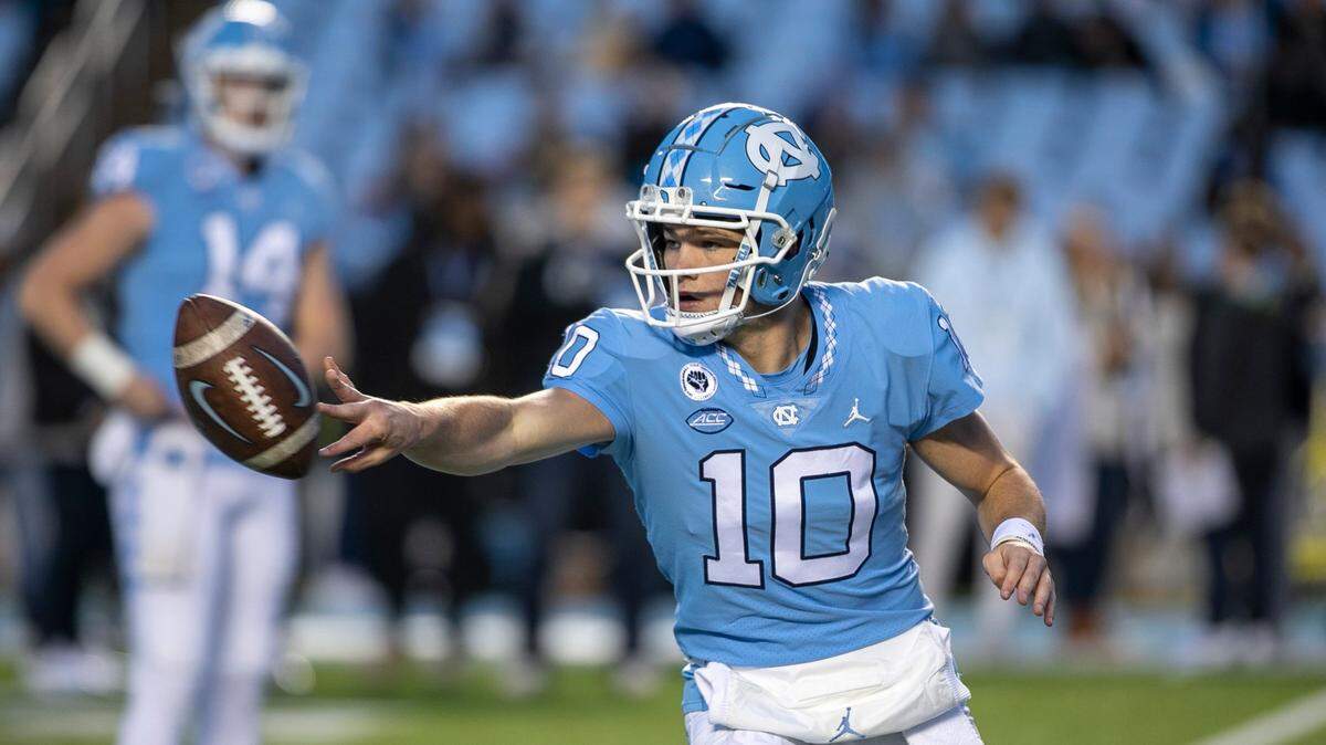 North Carolina quarterback Drake Maye (10) warms up for the Tar Heels’ game against Georgia Tech on Saturday, November 19, 2022 at Kenan Stadium in Chapel Hill, N.C.