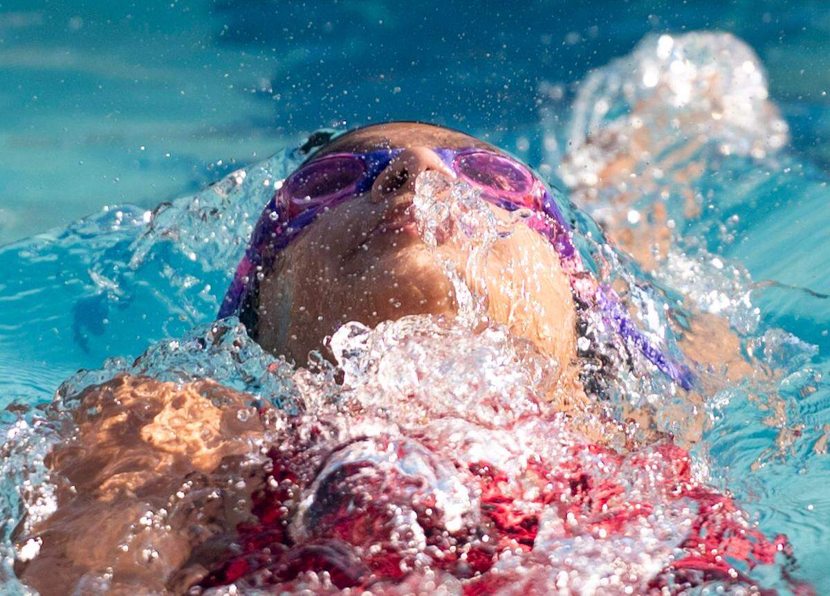 Nella Shah warms up for the Cary Park Sea Dragons swim meet on June 25, 2024.