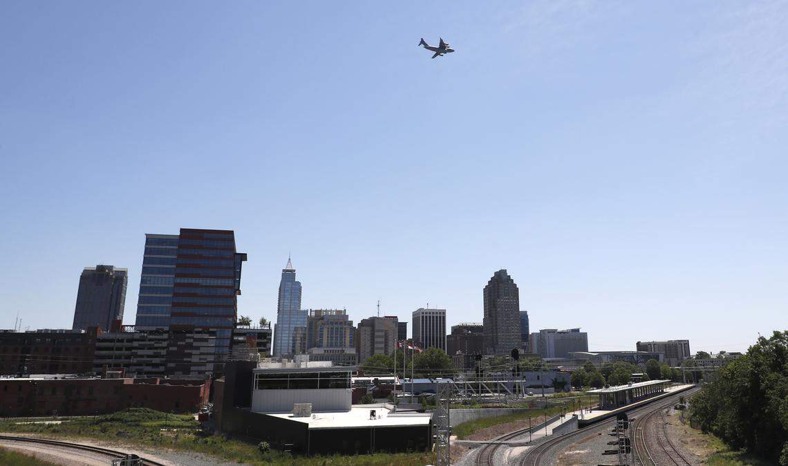A C-17 with the North Carolina Air National Guard flies over downtown Raleigh, N.C. as part of Operation American Resolve, an Air Force salute which includes flyovers to honor health care workers while performing regular training, Thursday, May 7, 2020.