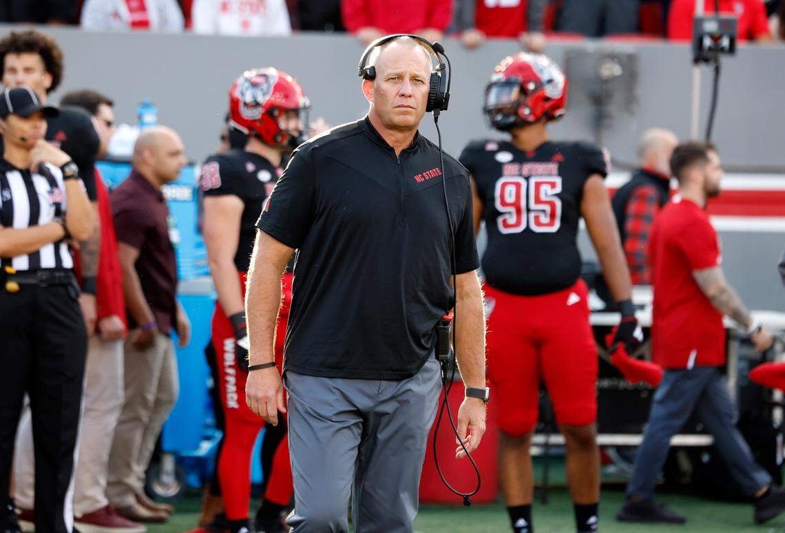 N.C. State head coach Dave Doeren watches the coin toss before N.C. State’s game against Duke at Carter-Finley Stadium in Raleigh, N.C., Sat. Nov. 9, 2024.