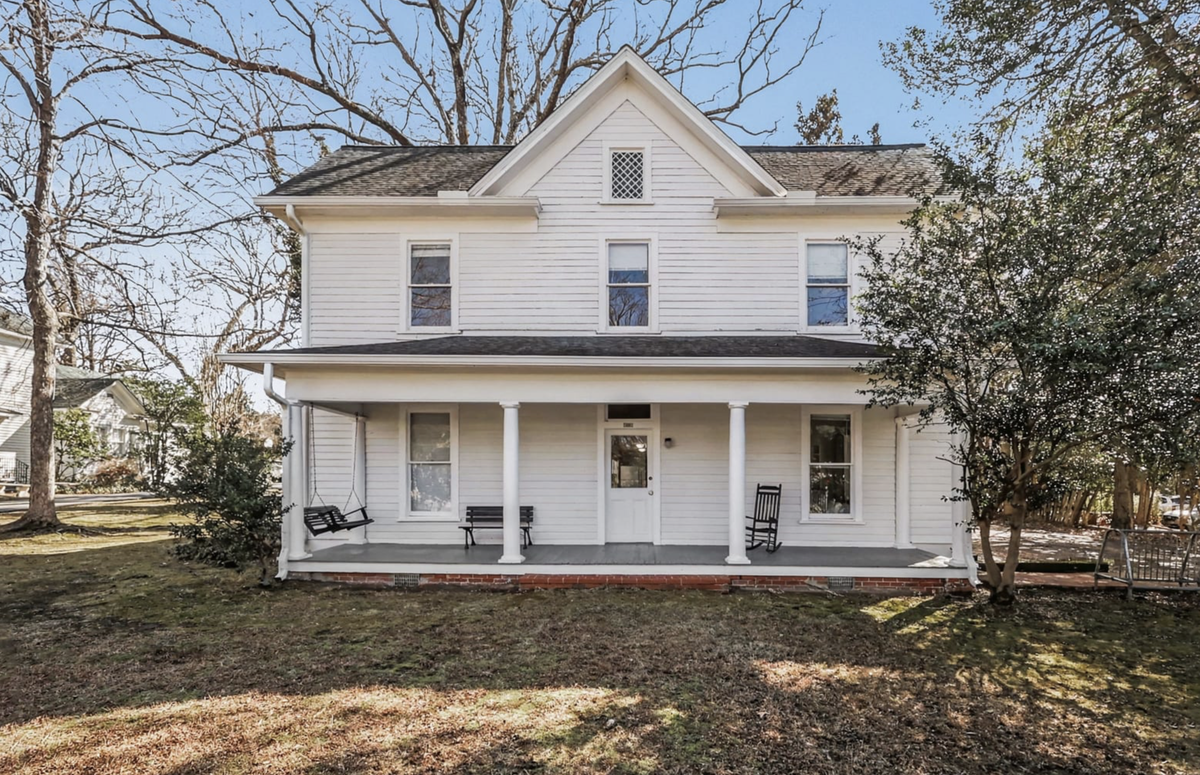 A listing photo of 223 McCauley St., one of a cluster of historic homes for sale in Chapel Hill.
