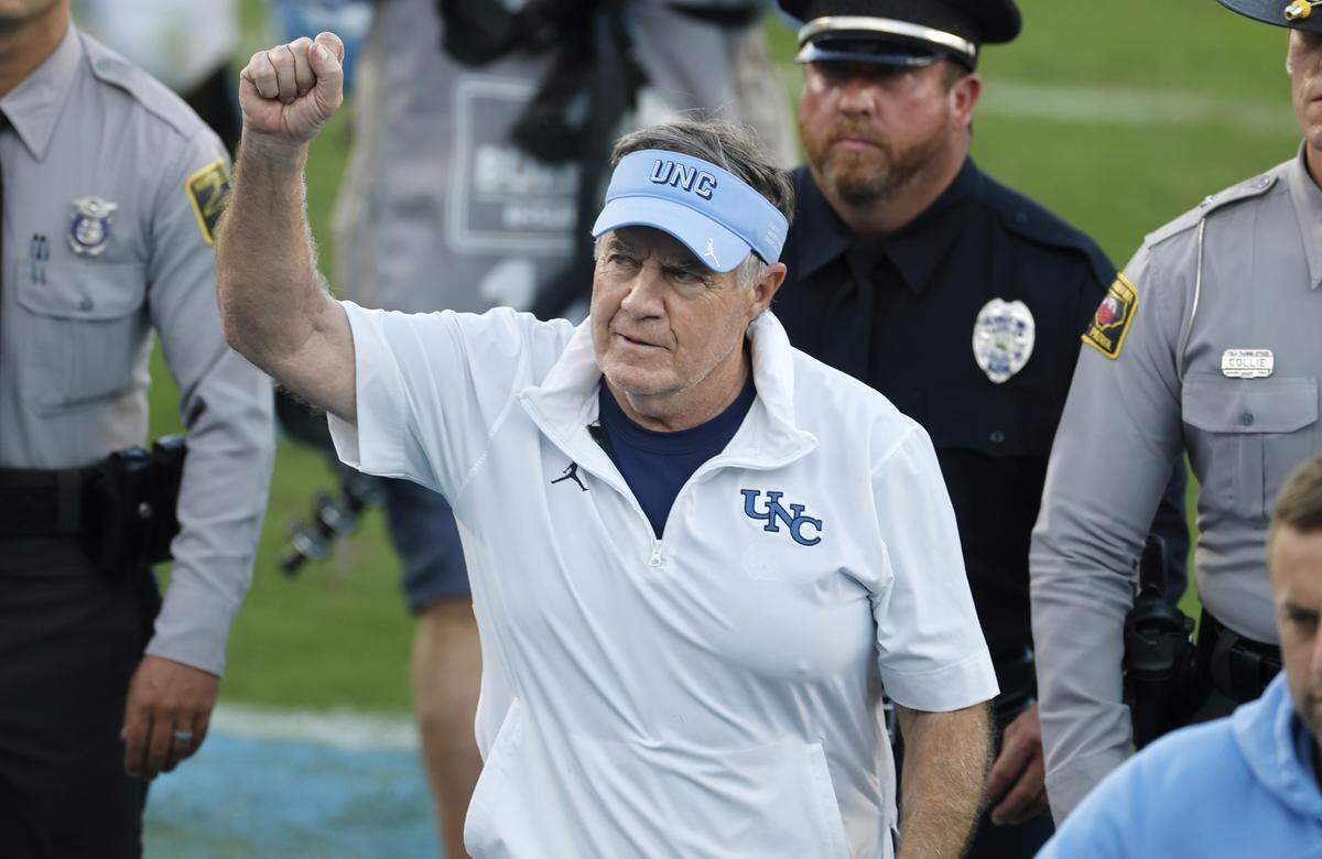 North Carolina head coach Bill Belichick celebrates as he walks off the field after UNC’s 41-6 victory over Richmond at Kenan Stadium in Chapel Hill, N.C., Saturday, Sept. 13, 2025.