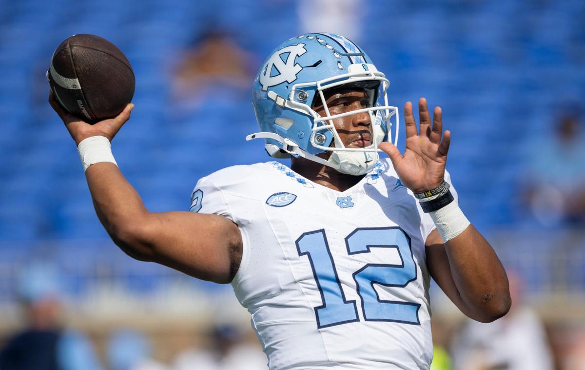 North Carolina quarterback Jacolby Criswell (12) warms up for the Tar Heels’ game against Duke on Saturday, September 28, 2024 at Wallace Wade Stadium in Durham, N.C.