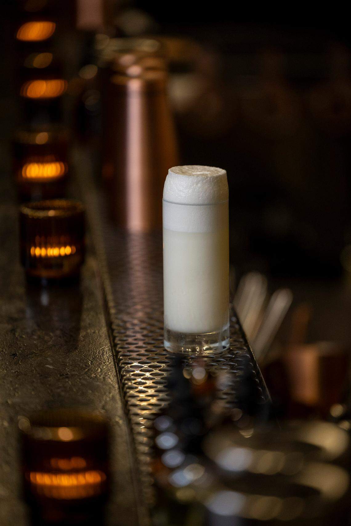 A Ramos Fizz Gin at Scott Crawford’s new cocktail bar, Sous Terre, at 620 North Person Street below Jolie, Crawford’s French bistro.