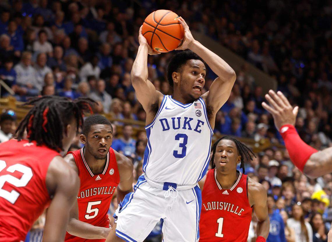 Duke’s Jeremy Roach (3) passes out of the defensive pressure during the second first half of Duke’s 79-62 victory over Louisville at Cameron Indoor Stadium in Durham, N.C., Monday, Feb. 20, 2023.