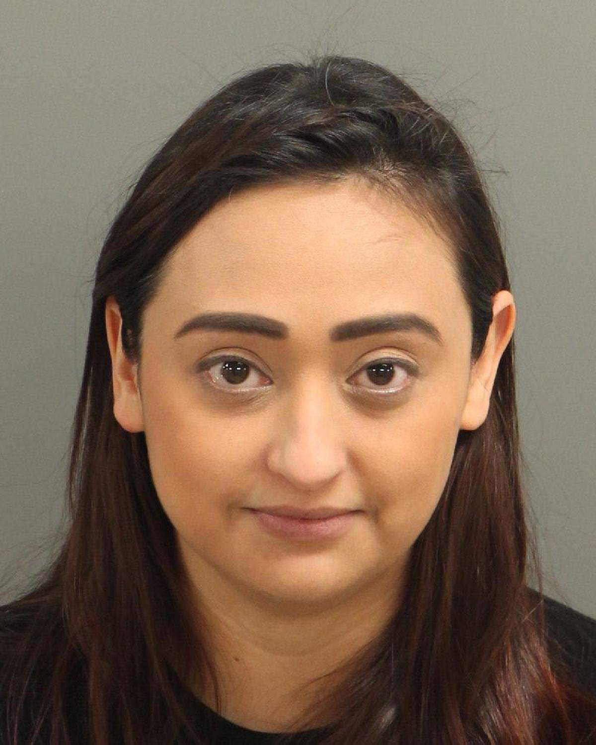 Jarlyn Sluss was charged with accessory after the fact to murder and obstruction of justice.