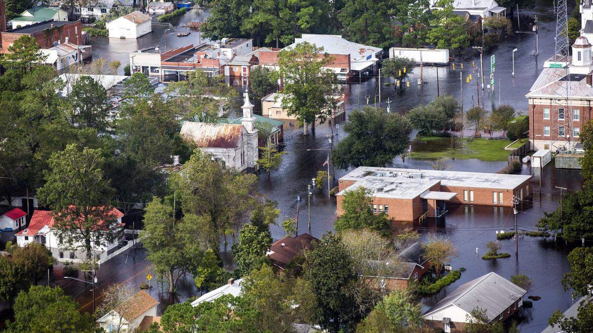 Three days after Hurricane Florence made landfall in Wilmington, NC, flood water still surrounds buildings in Trenton, NC, on Monday, Sept. 17, 2018.
