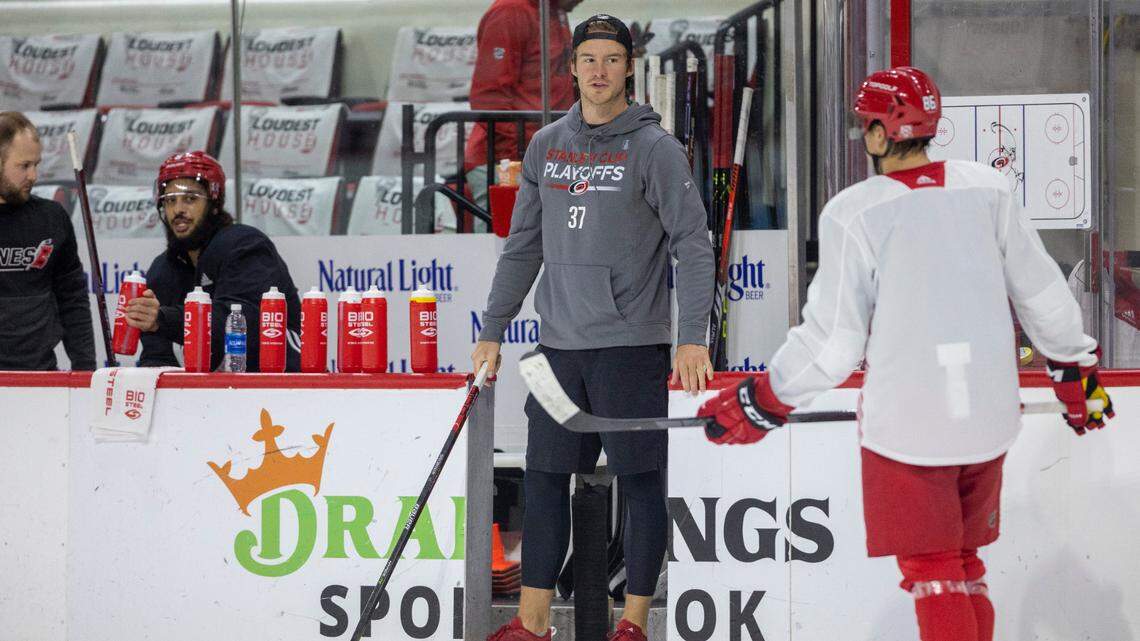 The Carolina Hurricanes Andrei Svechnikov (37) talks with Teuvo Teravainen (86) during the Hurricanes’ practice on Wednesday, May 17, 2023 at PNC Arena in Raleigh, N.C. Svechnikov is recovering ACL surgery and Teravainen is expected to return soon after breaking his hand.