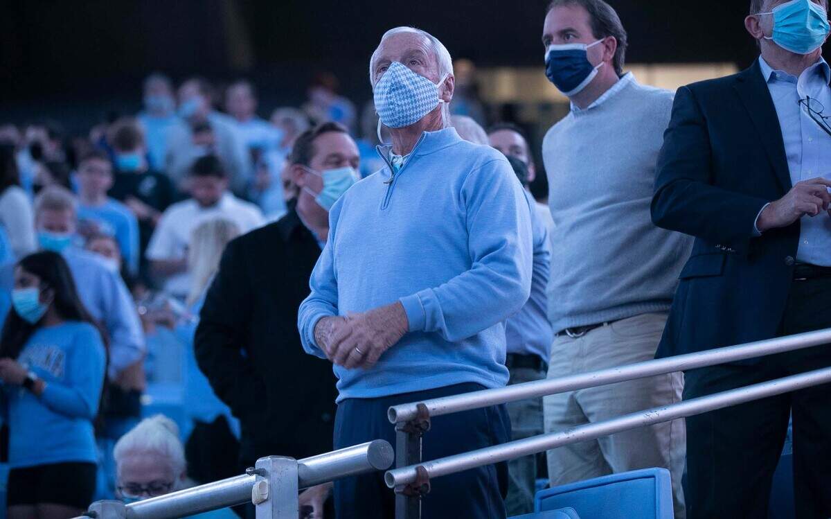 Former North Carolina coach Roy Williams stands as the Tar Heels prepare to enter the Smith Center for their game against Loyola Maryland on Tuesday, November 9, 2021 in Chapel Hill, N.C.