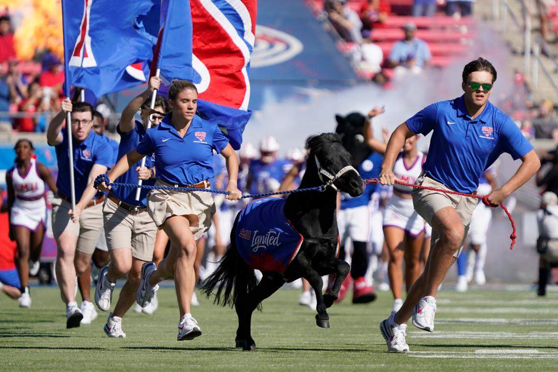 SMU mascot Peruna leads the team onto the field prior to a game against the Cincinnati Bearcats at Gerald J. Ford Stadium.