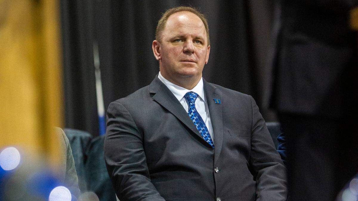 Mike Elko waits to be introduced as Duke University’s head football coach during a press conference at Pascal Field House in Durham, Monday, Dec. 13, 2021.