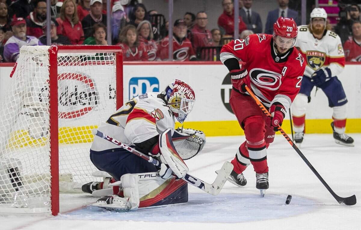 The Carolina Hurricanes Sebastian Aho (20) works the puck in front of Florida Panther goalie Sergei Bobrovsky (72) during the second overtime period during Game 1 of the Eastern Conference Finals on Thursday, May 18, 2023 at PNC Arena in Raleigh, N. C.