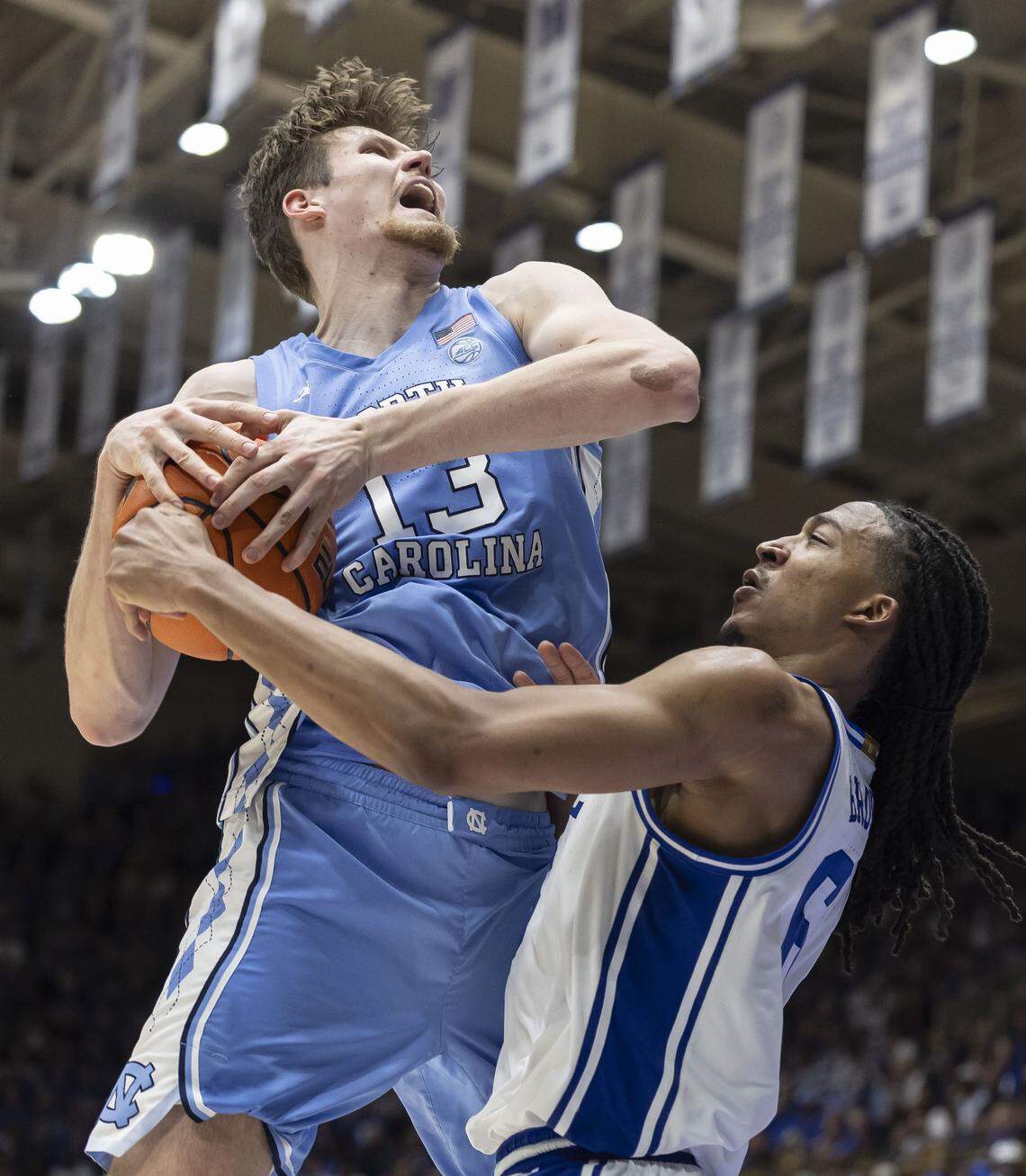 North Carolina center Henri Veesaar (13) secures a defensive rebound against Duke forward Maliq Brown (6) in the second half on Saturday, March 7, 2026 at Cameron Indoor Stadium in Durham, N.C.