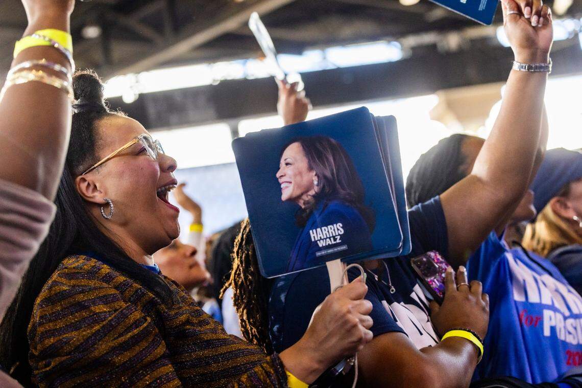 Supporters cheer on Vice President Kamala Harris as she speaks speaks during a rally at Coastal Credit Union Music Park at Walnut Creek in Raleigh on Wednesday, Oct. 30, 2024.