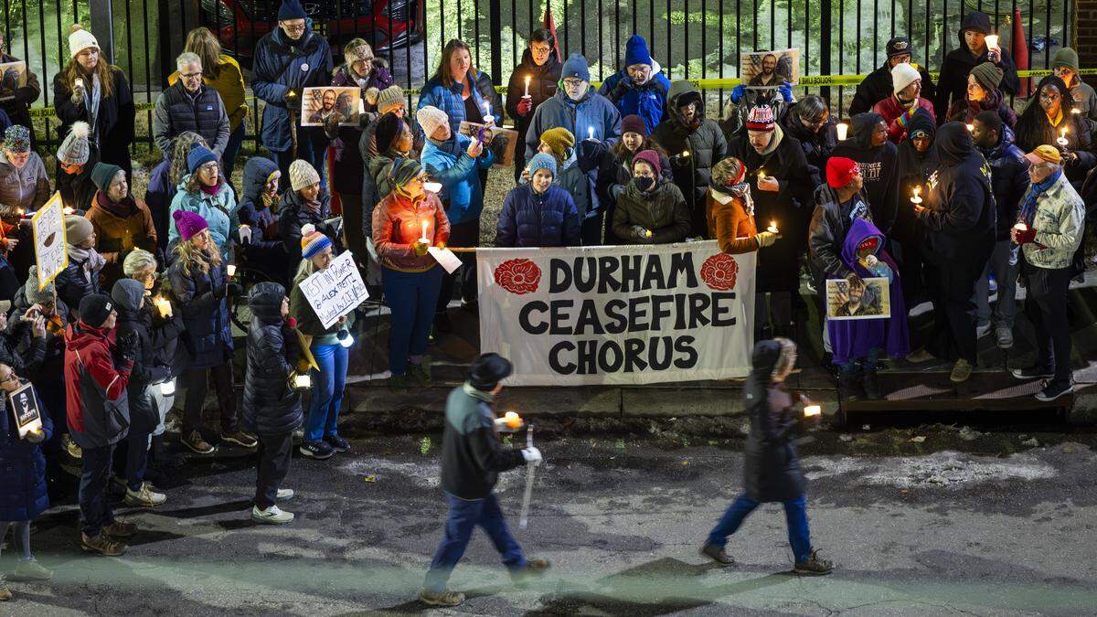 About 200 demonstrators held a candlelight vigil Wednesday, Jan. 28, 2026, outside the Durham VA Medical Center to honor Alex Pretti, a 37-year-old Minneapolis intensive care nurse with the Department of Veterans Affairs. Pretti was shot and killed Jan. 24, 2026, during a federal immigration enforcement operation in Minneapolis, an incident that has sparked widespread protests and calls for investigation.