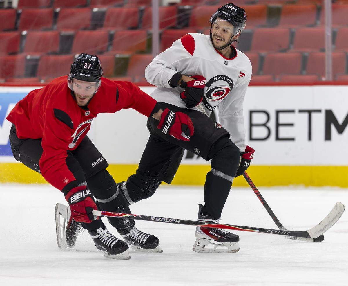 Carolina Hurricanes right wing Andrei Svechnikov (37) and center Jesperi Kotkaniemi (82) work out during their practice on Friday, May 15, 2026 at Lenovo Center in Raleigh, N.C.