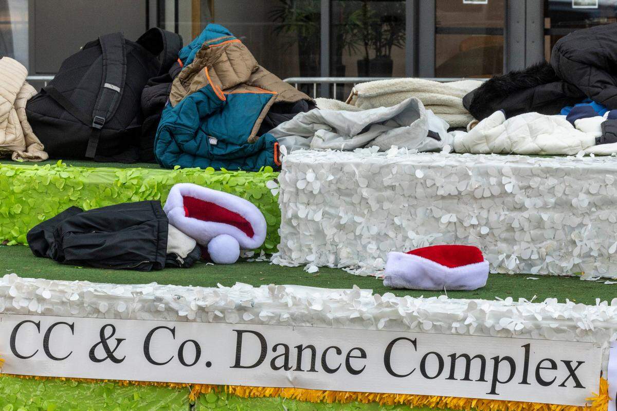 Personal effects lay on a Christmas float at the scene of an accident where a truck pulling a the float lost control and hit a parade participant near the intersection of Hillsborough Street and Boylan Avenue Saturday, Nov. 19, 2022.
