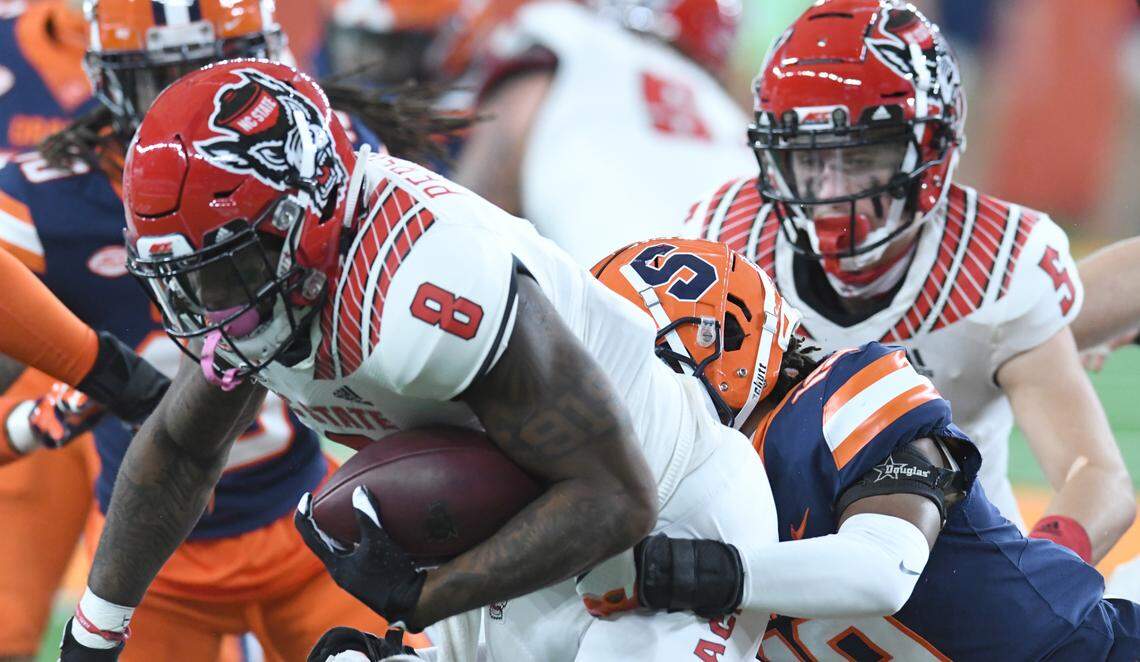North Carolina State Wolfpack running back Ricky Person Jr. (8) runs for yards during a game against Syracuse on Saturday, Nov. 28, 2020, at the Carrier Dome in Syracuse, N.Y.
