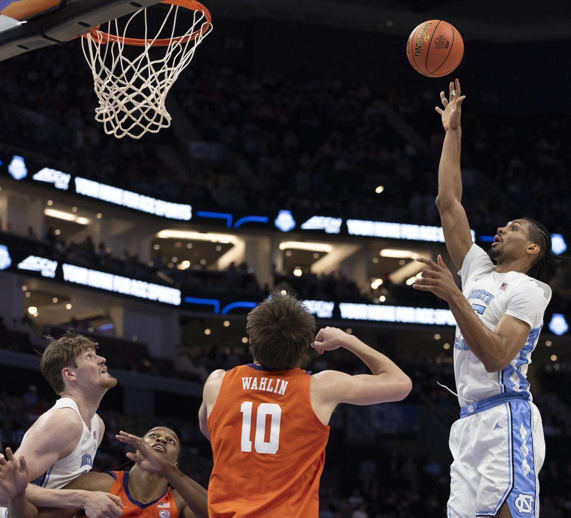North Carolina forward Jarin Stevenson (15) puts up a shot over Clemson’s Jake Whalin (10) in the first half on Thursday, March 12, 2026, during the quarterfinals of the ACC Tournament at Spectrum Center in Charlotte, N.C.