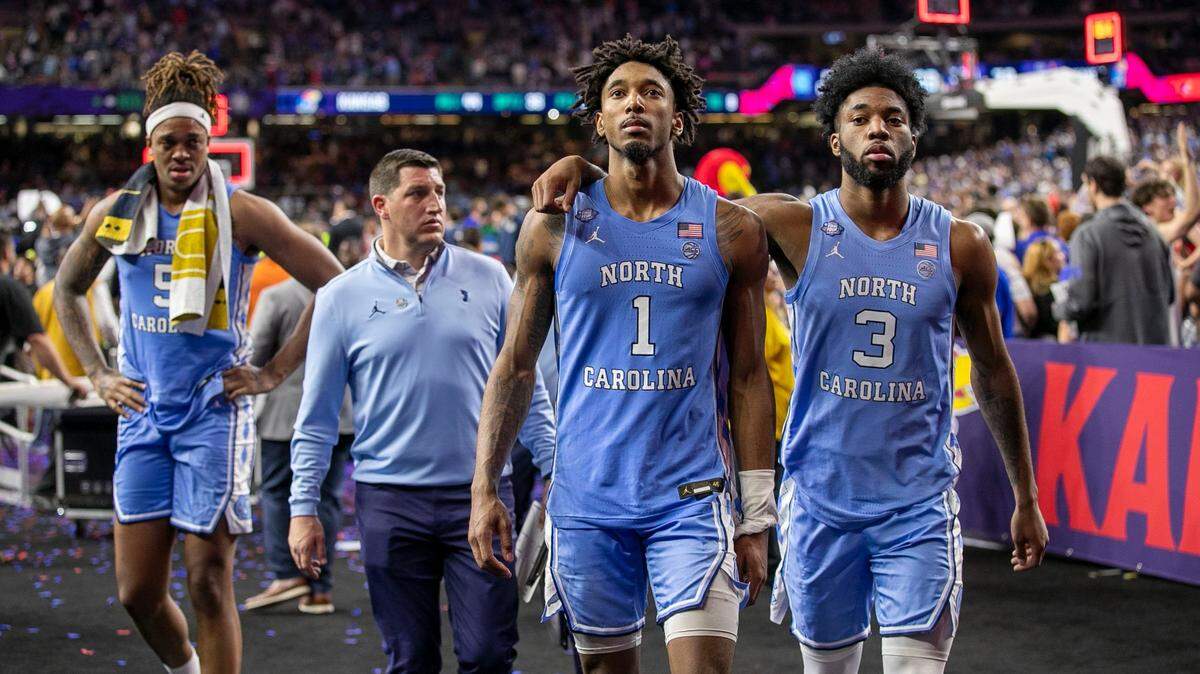 North Carolinas Armando Bacot (5), Leaky Black (1) and Dontrez Styles (3) leave the court following the the Tar Heels 72-69 loss to Kansas in the NCAA Championship game on Monday, April 4, 2022 at Caesars Superdome in New Orleans, La.
