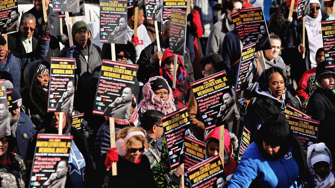 Hundreds march in Raleigh and Durham sharing Dr. King’s message of ‘infinite hope’