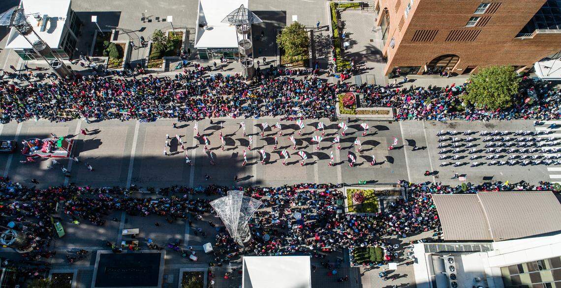 Tens of thousands of spectators lined the 1.4-mile route with a curbside view of traditional marching bands, floats and costumed characters, mixed with a sampling of entries entirely unique to Raleigh during the annual Christmas parade Saturday, Nov. 17, 2018 in downtown Raleigh. 