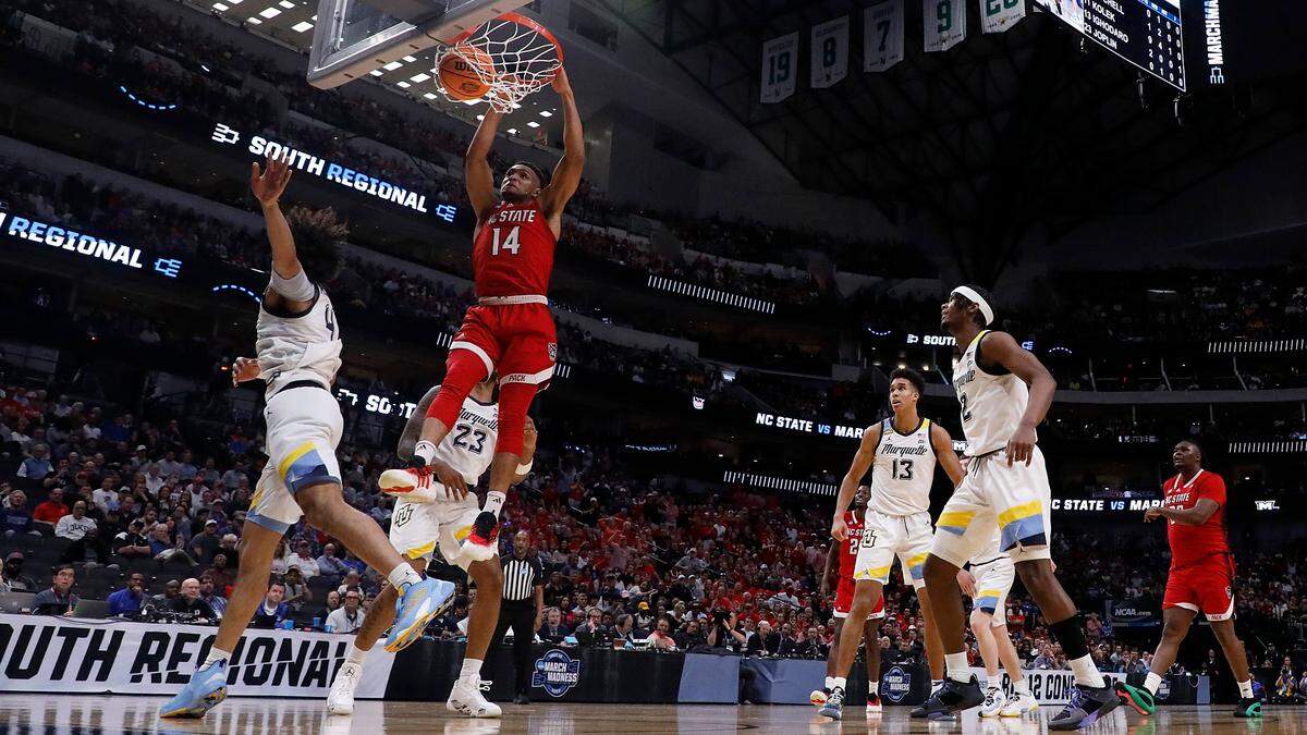 N.C. State’s Casey Morsell slams in two during the first half of the Wolfpack’s 67-58 win over Marquette in the NCAA Tournament Sweet 16 on Friday, March 29, 2024, at American Airlines Center in Dallas, Texas.
