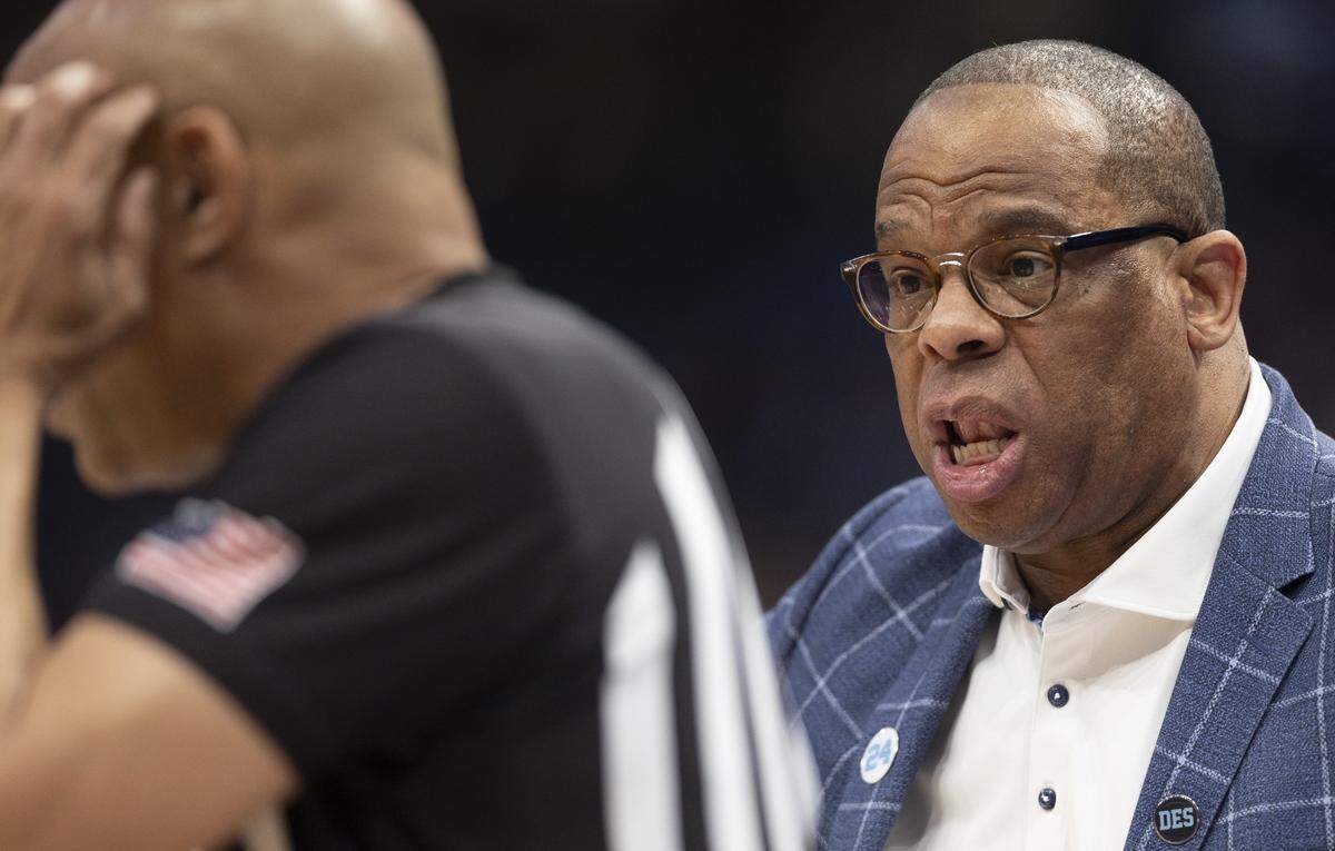 North Carolina coach Hubert Davis bends the ear of the official in the first half against N.C. State in the ACC Men’s Basketball Tournament Championship at Capitol One Arena on Saturday, March 16, 2024 in Washington, D.C.