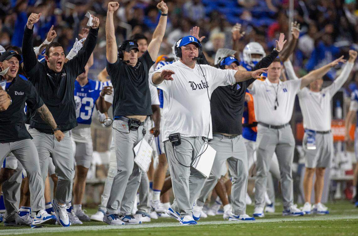 Duke coach Mike Elko and his assistants reacts after the Blue Devils blocked a field goal attempt by Clemson’s Robert Gunn III in the first quarter on Monday, September 4, 2023 at Wallace Wade Stadium Stadium in Durham, N.C.