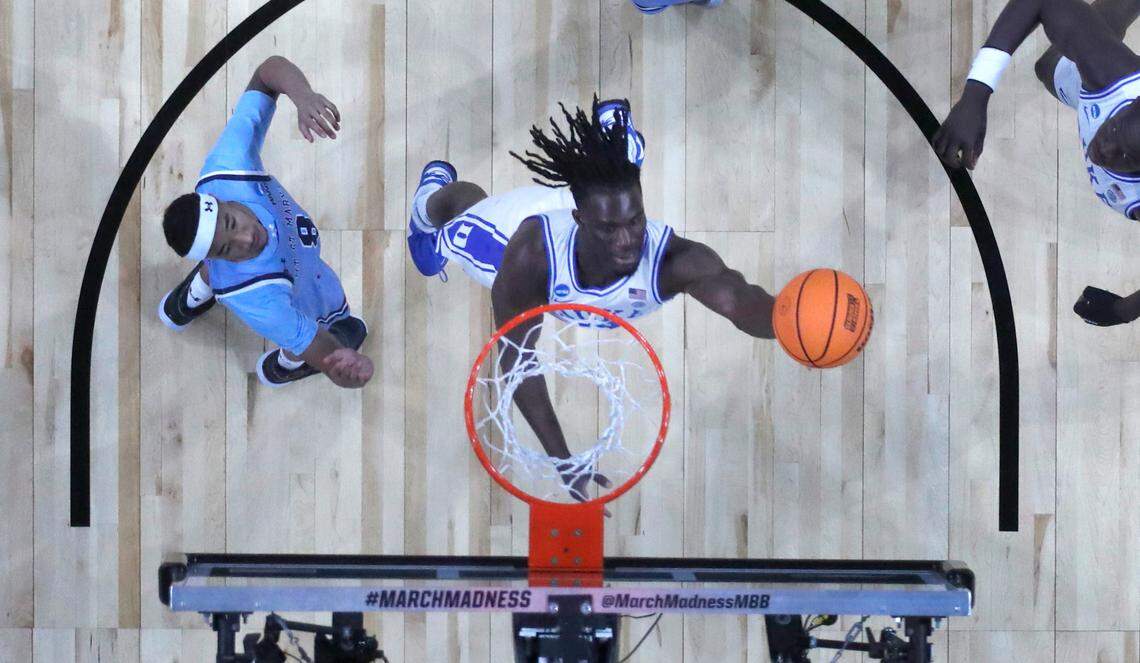 Duke’s Sion James (14) shoots during Duke’s 93-49 victory over Mount St. Mary’s in the first round of the 2025 NCAA Men’s Basketball Tournament at the Lenovo Center in Raleigh, N.C., Friday, March 21, 2025.