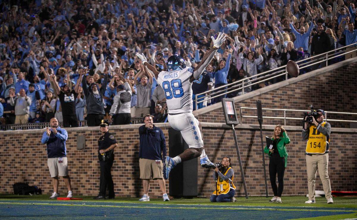 North Carolina’s Kamari Morales (88) reacts after scoring a touchdown on a 10 yard pass from quarterback Drake Maye in the first quarter against Duke on Saturday, October 15, 2022 at Wallace-Wade Stadium in Durham, N.C.