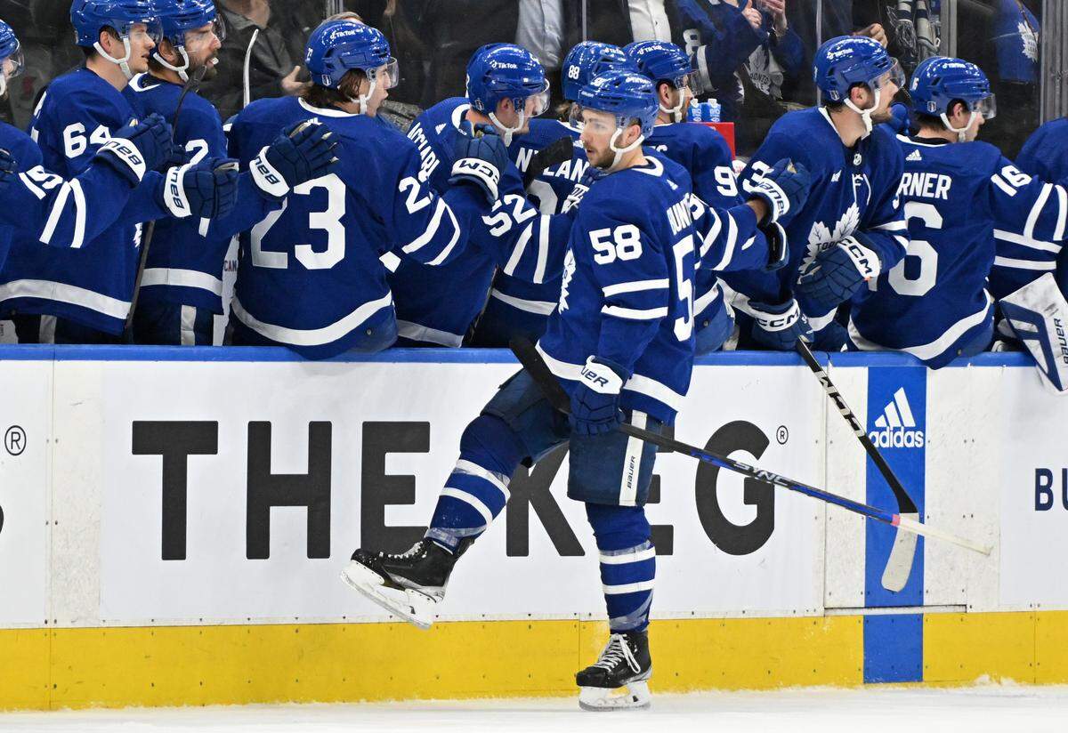 Toronto Maple Leafs forward Michael Bunting (58) celebrates with teammates at the bench after scoring a goal against the Florida Panthers in the second period in game one of the second round of the 2023 Stanley Cup Playoffs at Scotiabank Arena.
