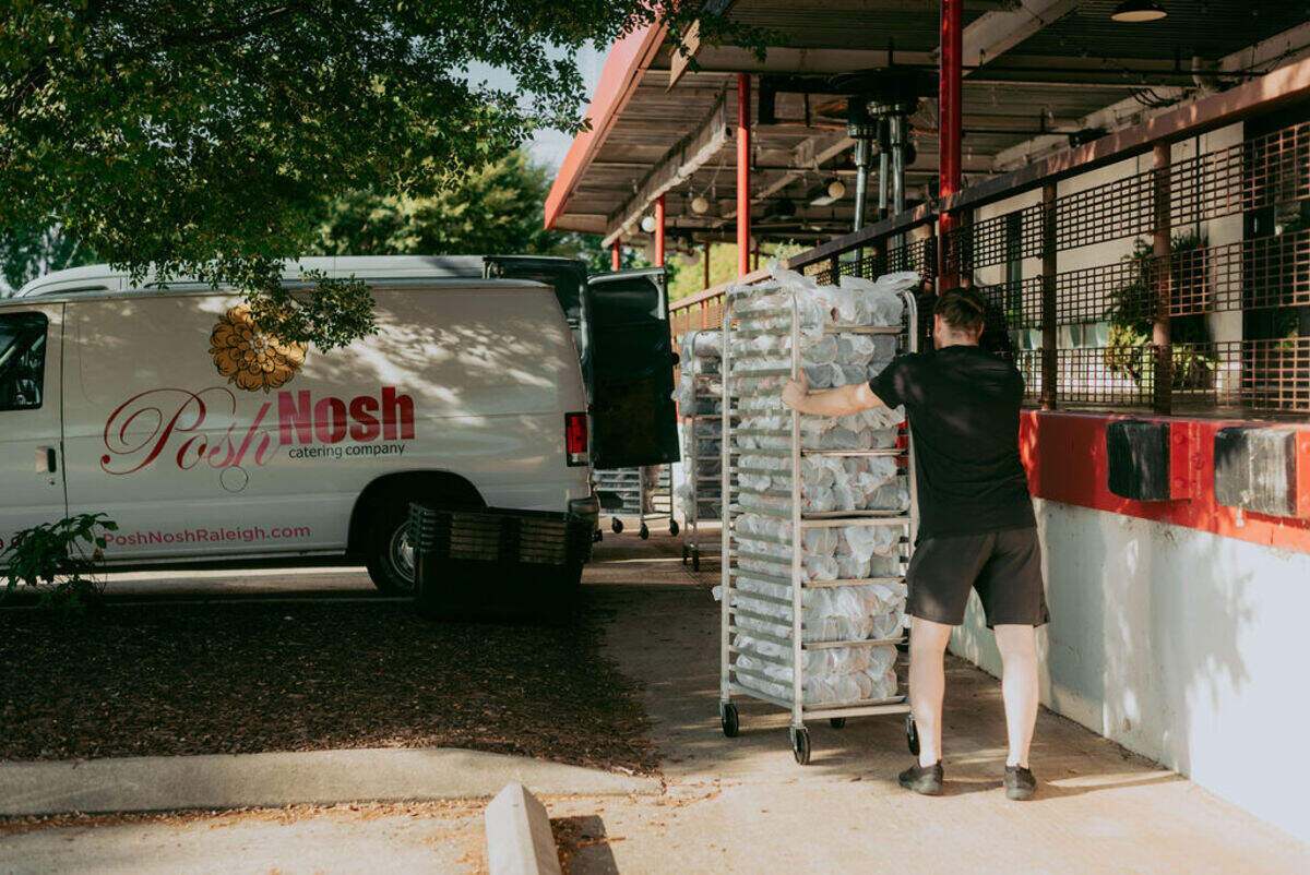 Meals leave PoshNosh Catering for Meals on Wheels of Wake County as part of Now Serving, which pairs community-based organizations with restaurants to provide healthy meals to neighbors in need.