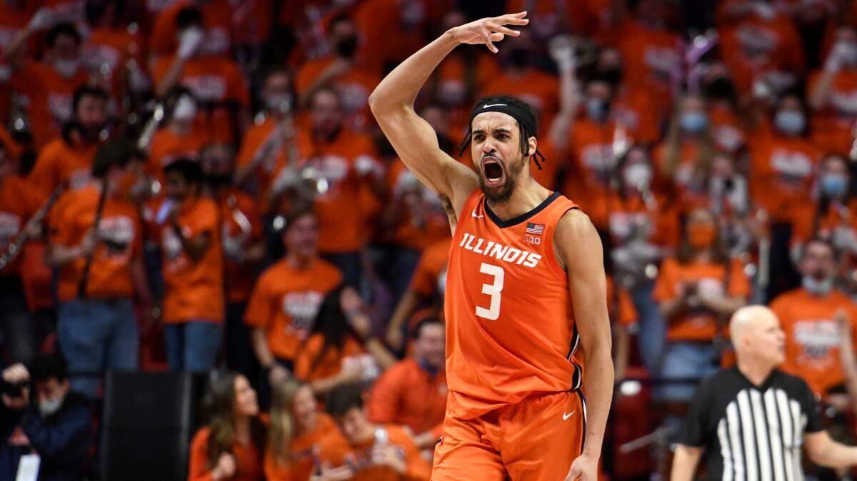 Illinois’ Jacob Grandison pumps up the crowd during their game against Ohio State Thursday, Feb. 24, 2022, in Champaign, Ill.