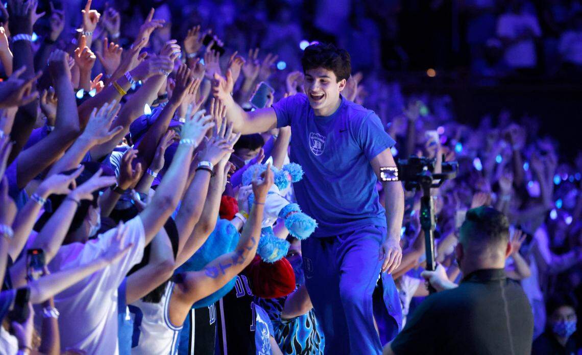Dukes Michael Savarino greets the Cameron Crazies after he was introduced during Countdown to Craziness at Cameron Indoor Stadium in Durham, N.C., Friday, October 15, 2021.