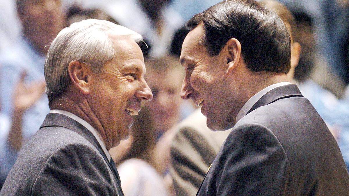Duke’s Mike Krzyzewski greets North Carolina’s Roy Williams prior to the start of their game at the Dean Smith Center Tuesday Feb.7, 2006 in Chapel Hill,NC.