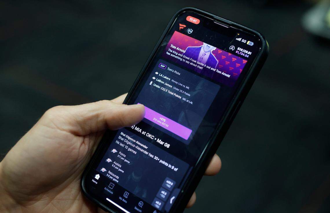 Rob Brazer, Vice President of Product for Fanatics Sportsbook, demonstrates the Fanatics Sportsbook app on Friday, March 8, 2024. Online sports betting in North Carolina will become legal Monday, March 11.