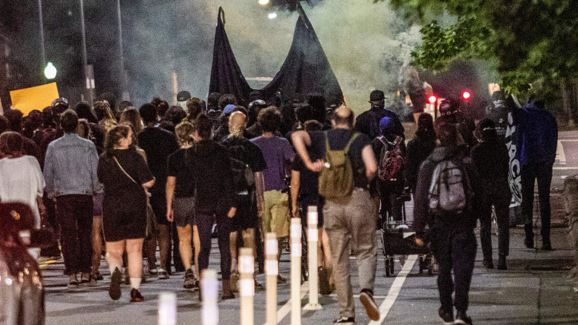Protesters evoking Black Lives Matter, social justice, march in Durham ...