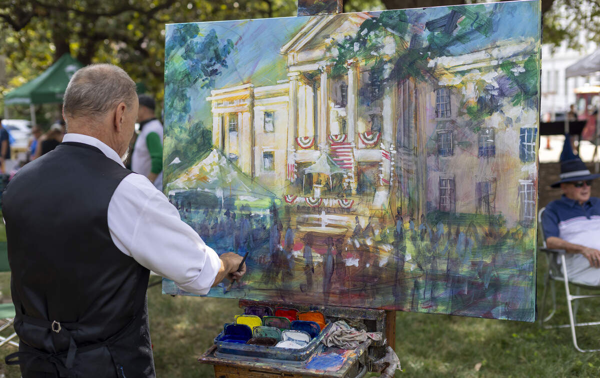 Dan Nelson works on his painting of the North Carolina State Capitol during the Freedom Fest 250, celebrating the country’s Semiquincentennial, on Saturday, July 4, 2026 in Raleigh, N.C.