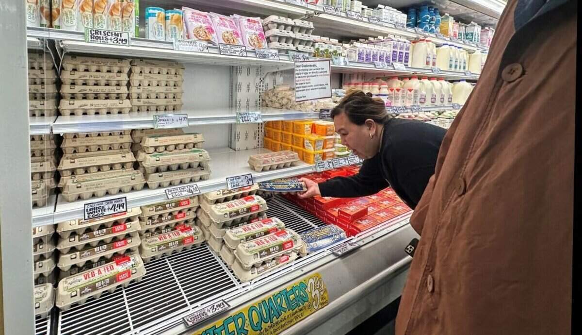 A shopper reaches for a carton of eggs from a grocery chain store asking customers to limit their purchases on February 10, 2025 in South Pasadena, California. A resurgence of avian flu, which first struck the United States in 2022, is hitting chicken farms hard, sending egg prices soaring and rattling consumers accustomed to buying this dietary staple for only a few dollars. (Photo by Frederic J. BROWN / AFP) (Photo by FREDERIC J. BROWN/AFP via Getty Images)