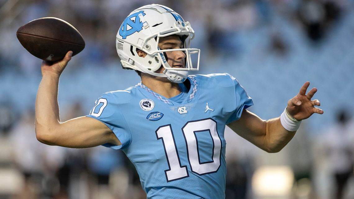 North Carolina quarterback Drake Maye (10) warms up for the Tar Heels season opener against Florida A&M on Saturday, August 27, 2022 at Kenan Stadium in Chapel Hill, N.C.