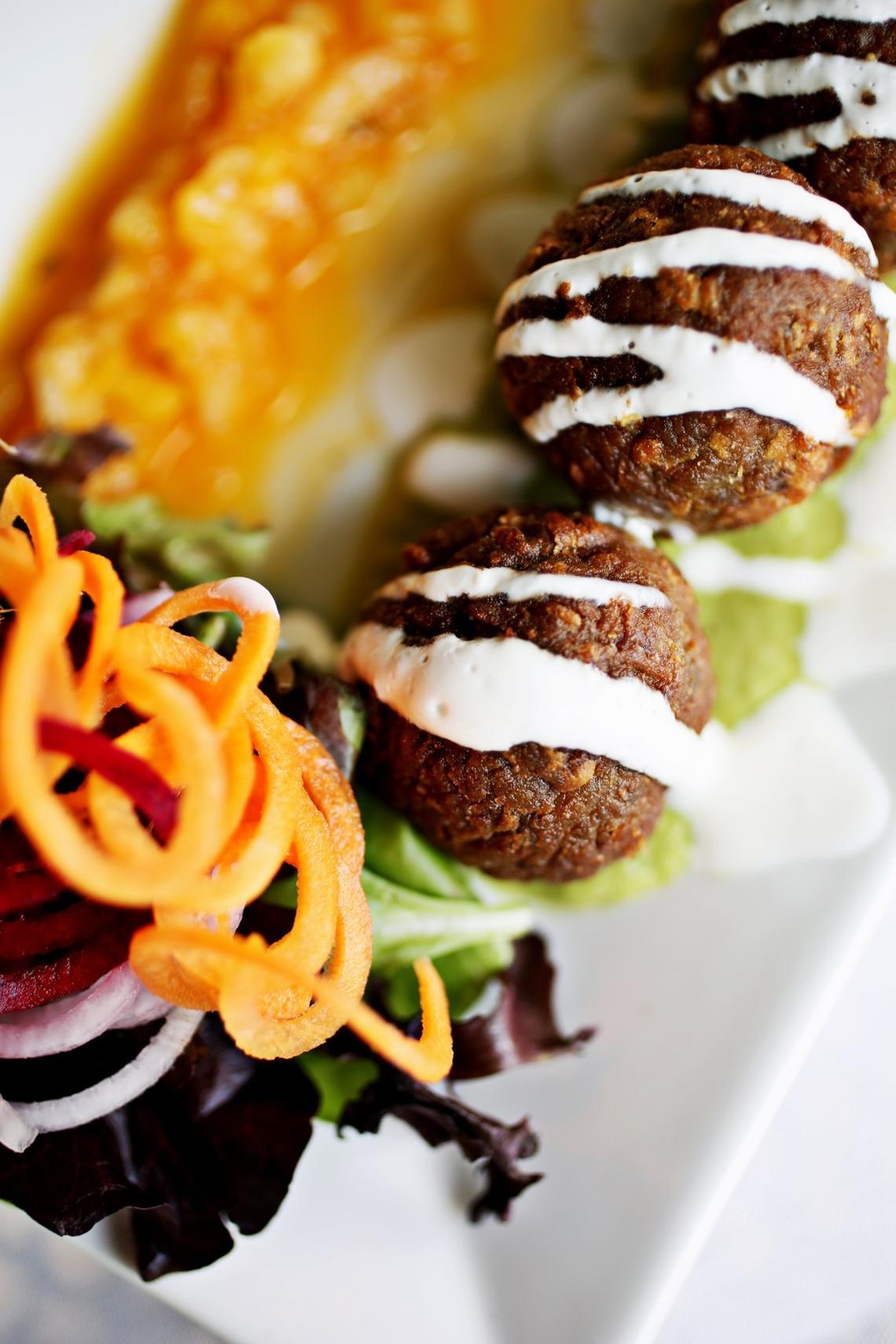 The Avocado Kofta is an avocado dumpling cooked on a skillet at Bawarchi Grill & Spirits in Apex.